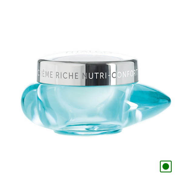 Thalgo Nutri-Comfort skincare cream jar, blue glass base with silver lid
